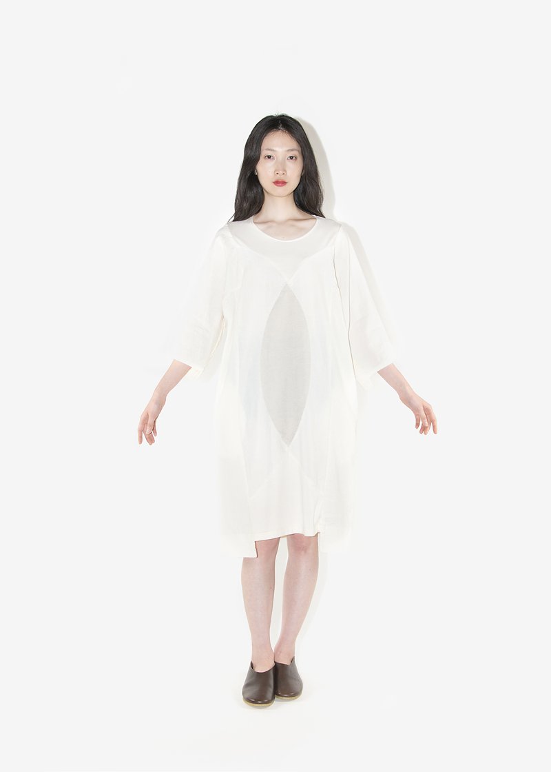 59. Geometric patterned dressDress composed of organic cotton single jersey and finest linen-wool fabric. The linen-wool part is composed of plain-woven fabric and twilled fabric.