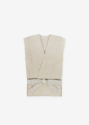 10. Kamikoromo kimono vest - wildflower herbal dyeToday, kozo, mitsumata and gampi are the principal raw materials for washi. Kozo is prized for its long, tough fibers. Kozo is cut at the root and steamed in a barrel over a fire in order to separate the bark. The bundles of fibers are placed in a cold stream for one to three days. The branches are boiled and stripped of their outer bark and then dried. The fibers are then boiled, placed in running water, and naturally bleached. The rinsed fibers are placed in a strainer floating in water for further cleaning and then laid on a board and beaten. Once they have dried overnight and have been softened by stamping or hand-rubbing, they are ready to be made into washi.
