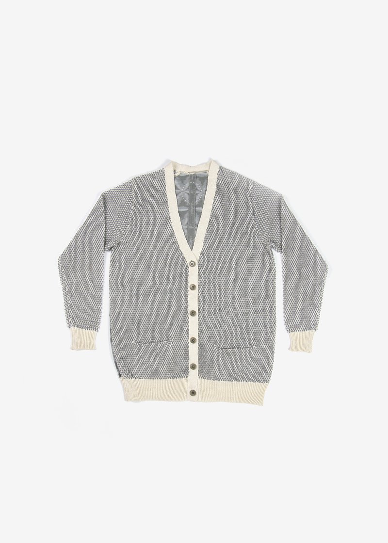 47. Flower of Life Kurume-kasuri cardigan - grayHand-loomed Kurume-kasuri textile with symbolic Flower of Life motif. The kasuri is made from organic cotton. Composed with hemp knitting. Comes in gray, beige and natural indigo.