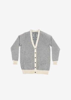 47. Flower of Life Kurume-kasuri cardigan - grayHand-loomed Kurume-kasuri textile with symbolic Flower of Life motif. The kasuri is made from organic cotton. Composed with hemp knitting. Comes in gray, beige and natural indigo.