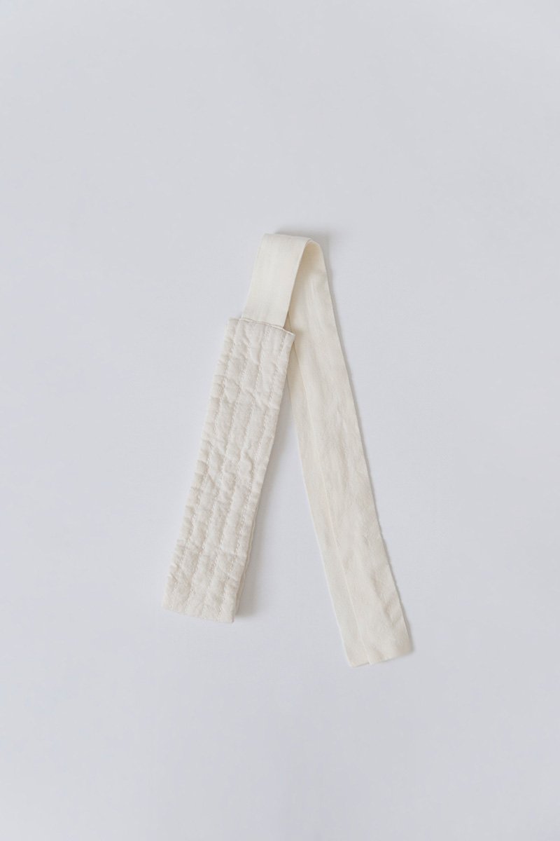 03. Hand-spun cotton beltThe cotton used for the collection are cultivated with organic farming methods. It was hand-spun, and producing a soft and plush fabric. Woven slowly with a shuttle weaving machine.