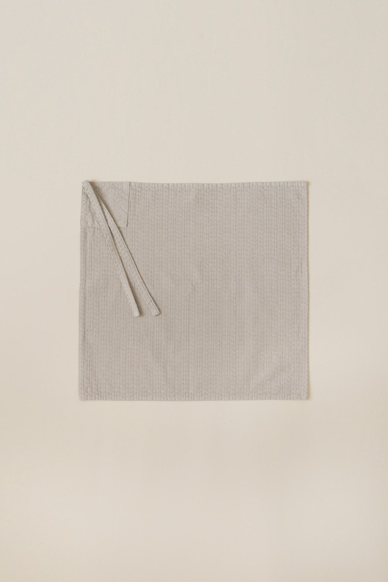 34. Sashiko wrapping cloth largeFabric woven with sashiko techniques using shuttle weaving machine. Fabric is composed of organic cotton for the warp, and alternate layers of hemp threads and organic cotton for the woof. Sashiko stitches are cross woven with twisted hemp threads.