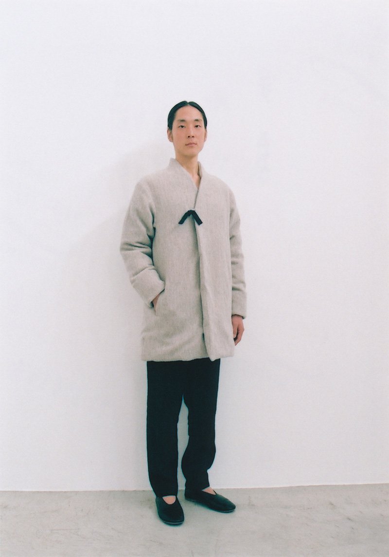 13.Wool and linen down coatThe front cloth is made of wool and linen. Inner cotton is 90% Down, 10% Feather.