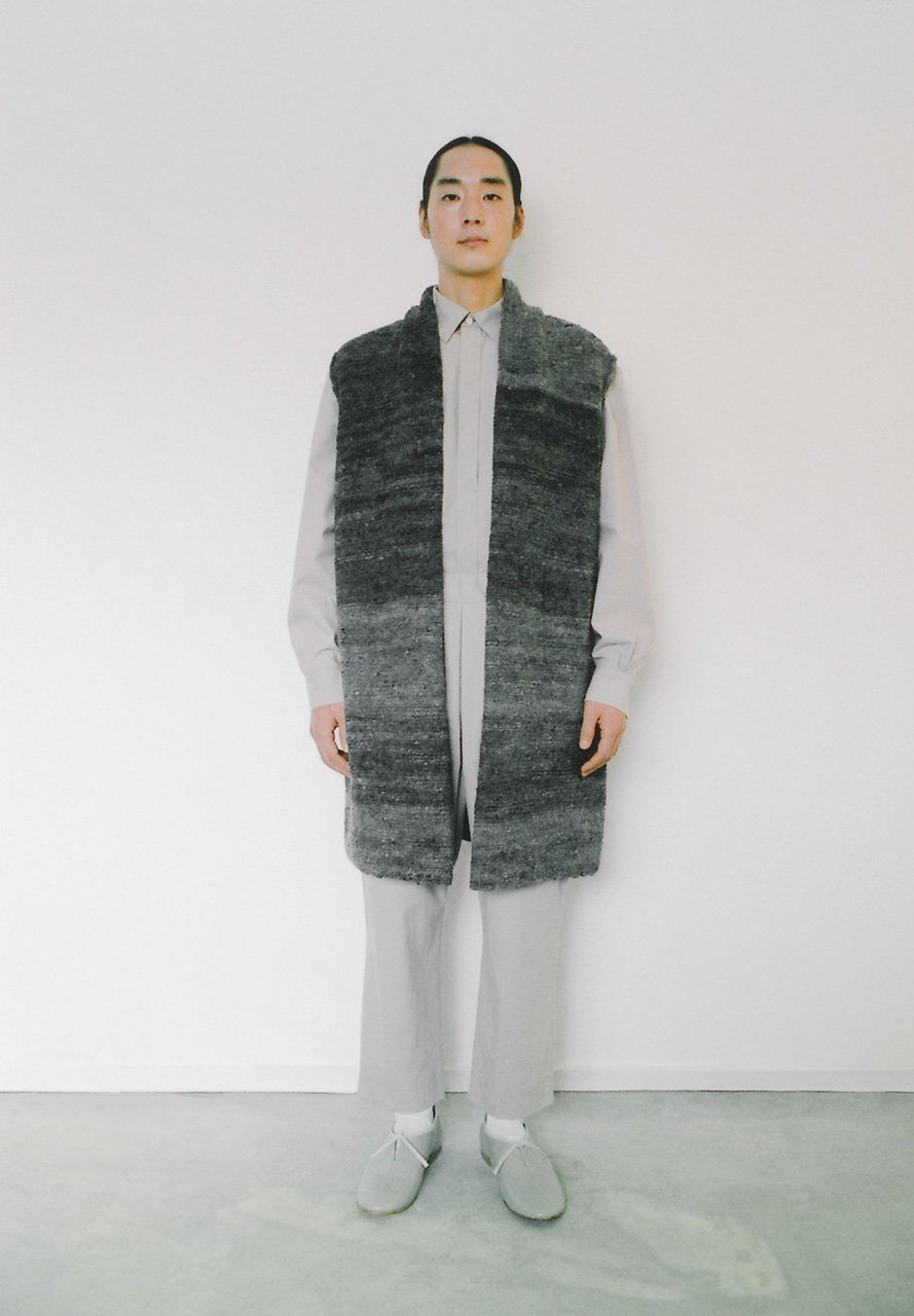 Hand-knitted haori vest made of hand-spun gray wool, by sheep from a farm in Hokkaido.