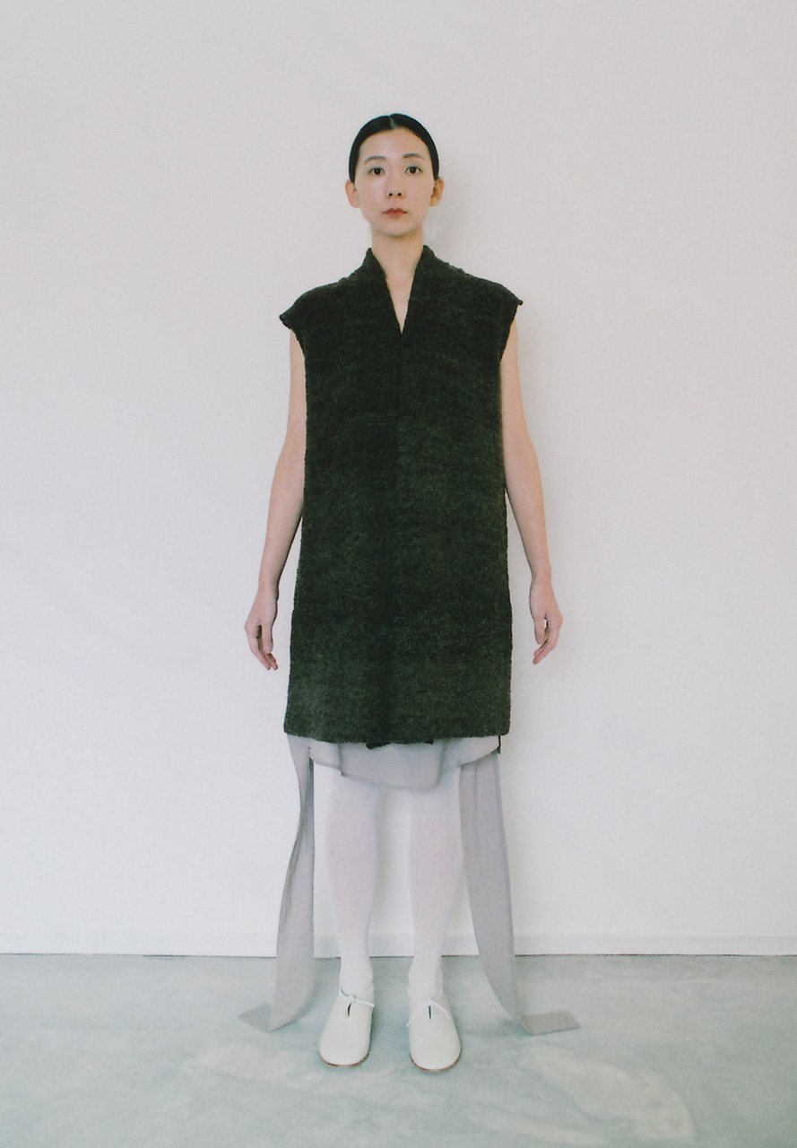 Hand-knitted haori vest made of hand-spun brown wool, by sheep from a farm in Kyoto.