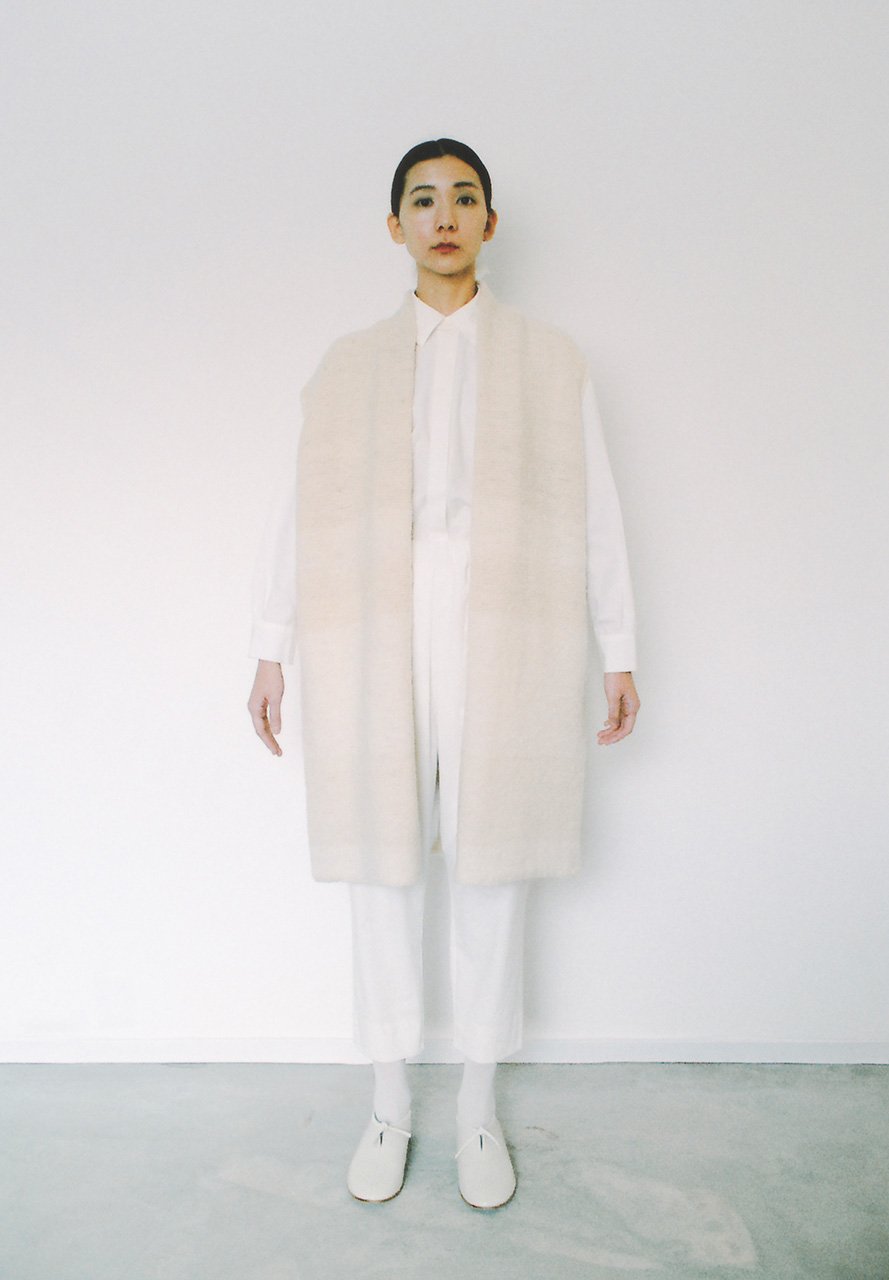 Hand-knitted haori vest made of hand-spun white wool, by sheep from a farm in Mie prefecture.
