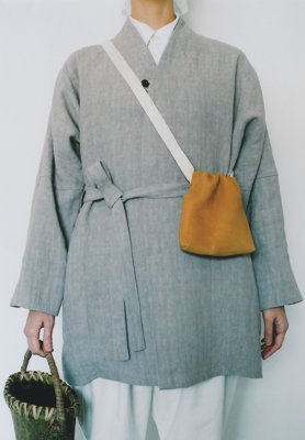 Jomon tanned and smoked leather drawstring bag, Japanese wing nut tree hand basket.