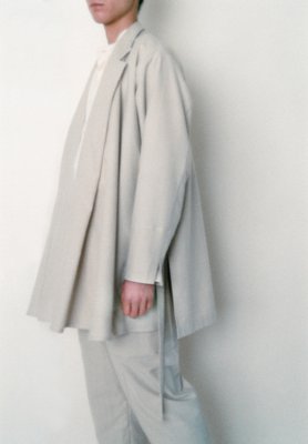 Cotton wool beige colored flannel shirt jacket and folk wrapped pants