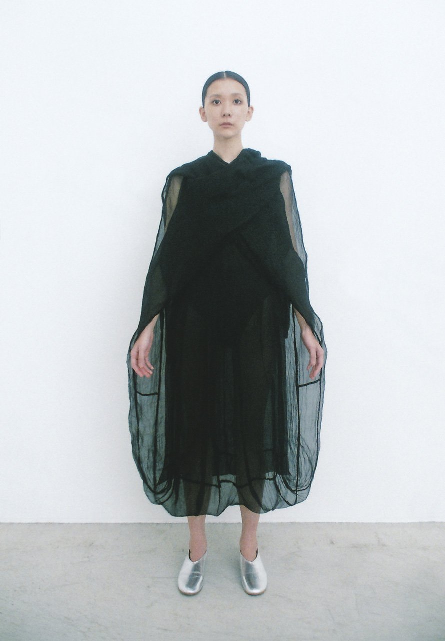 Fountain's water fetching earth soil color by mud-dyed hand-woven silk dress