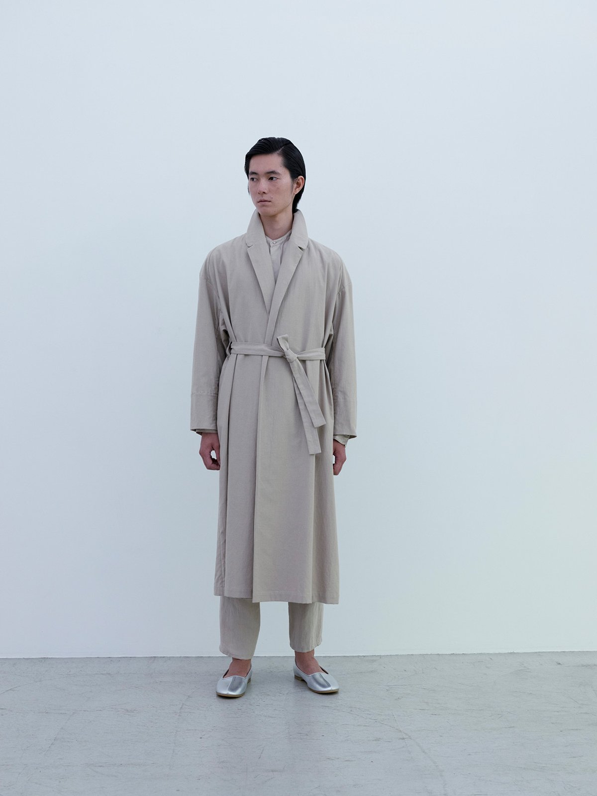 Classic back satin belted coat, Beeswax colored Silk twill shirt, Linen Oxford “tattuke” pants, Silver folk shoes
