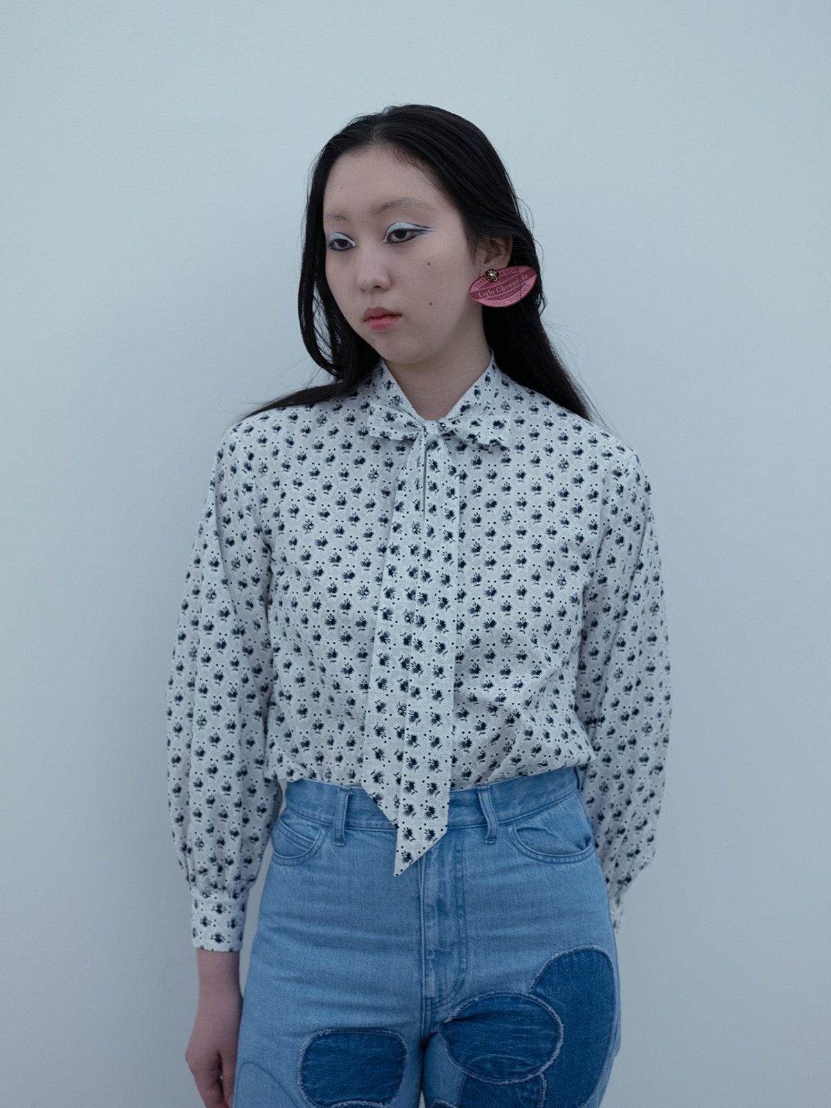 Old owlish floral-patterned bowtie shirt