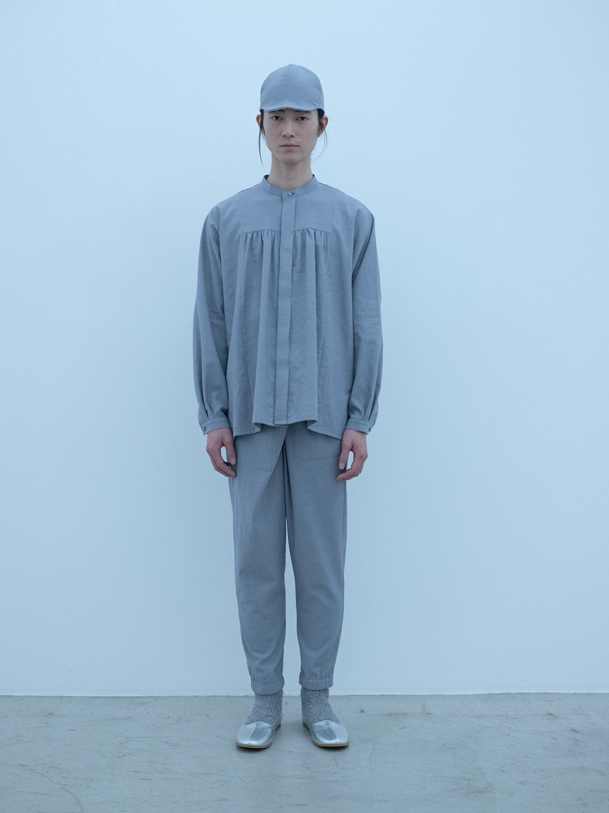 Light merino wool linen cotton glencheck elegant gathered shirt, wrapped pants with elastic hem, folk cap