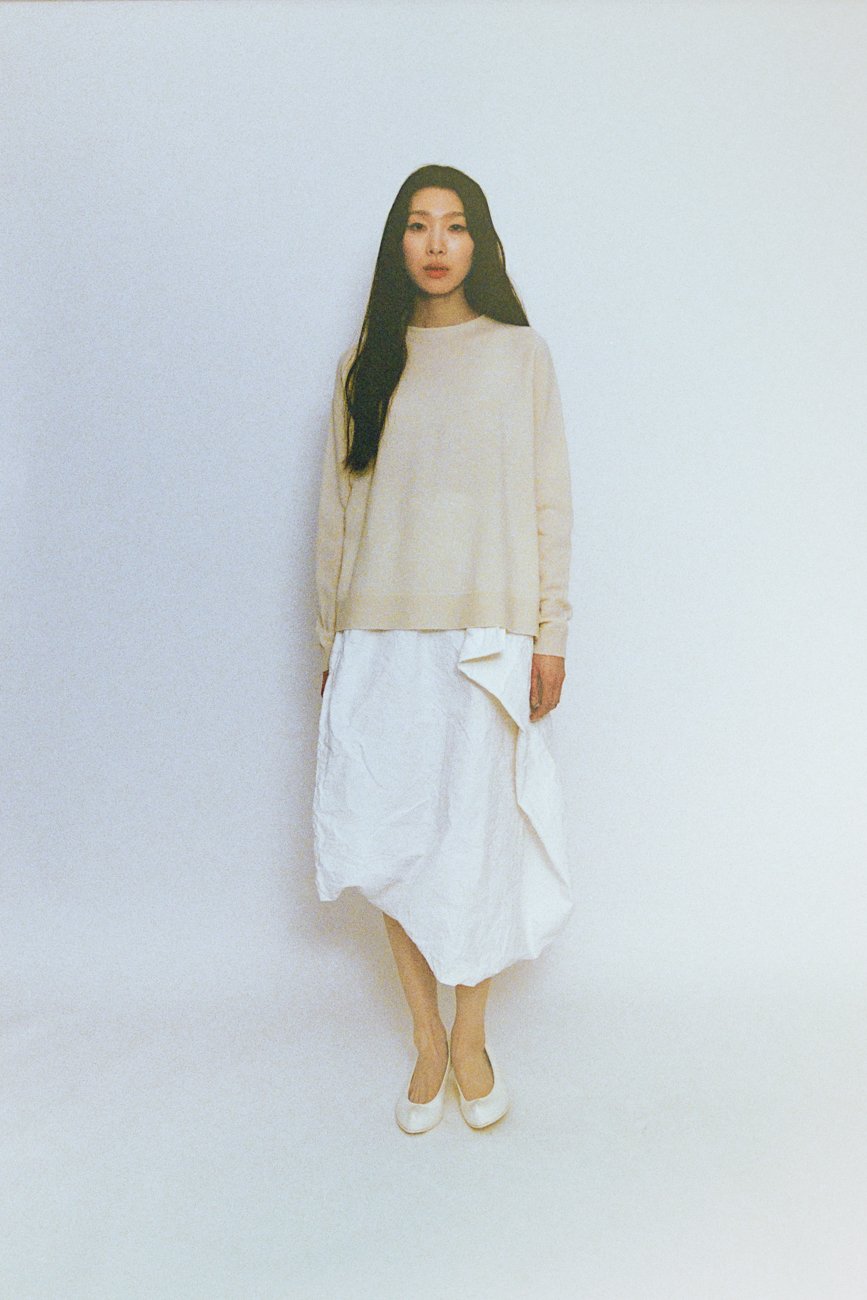 Tasmanian wool knitted sweater. Antique pillowcase skirt.