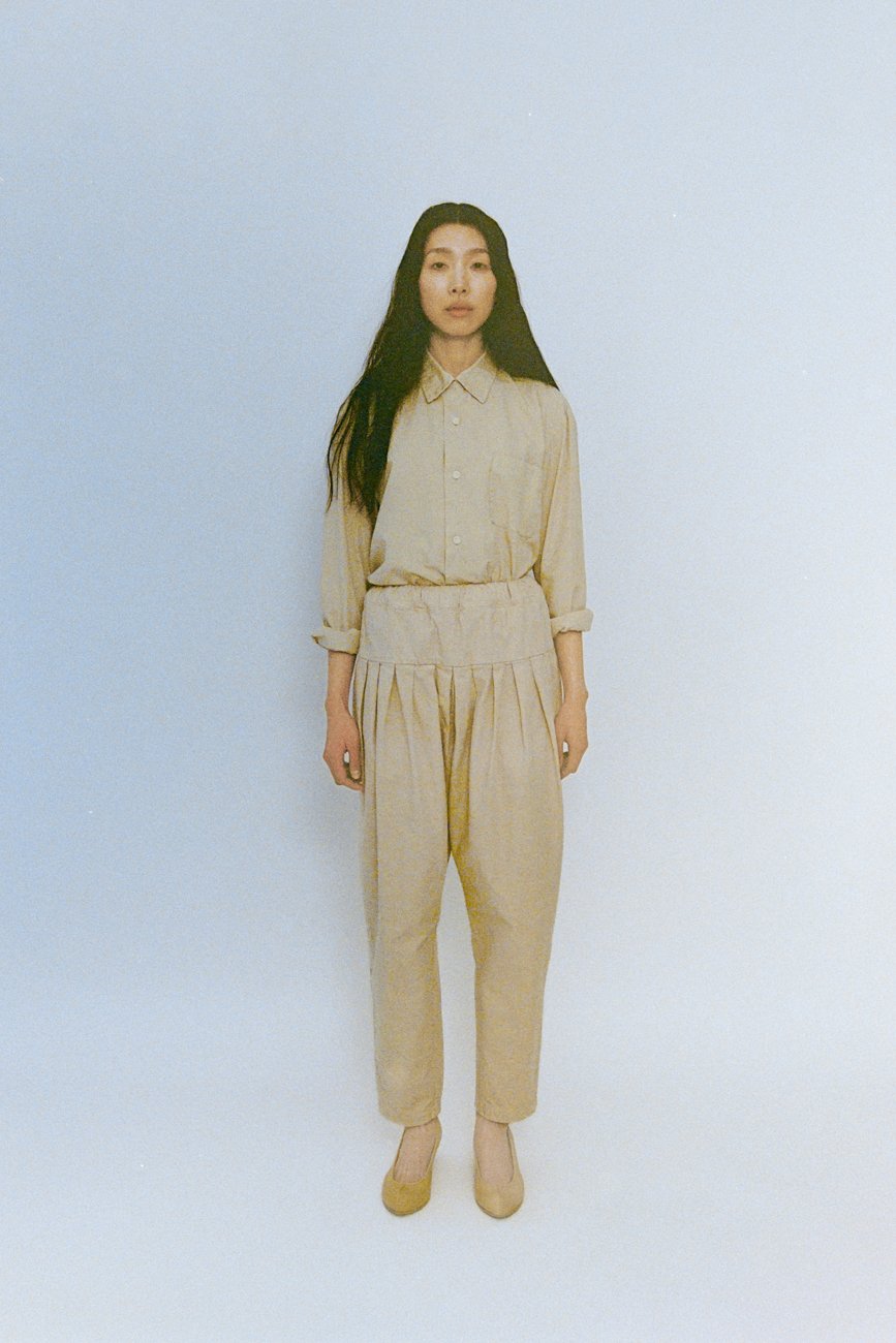 Organic cotton broadcloth open-collared shirt. Cotton canvas folk pants.