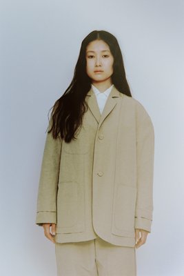 Unique reversible jacket with tailored collar folded inside. Made of cotton-nylon linen ramie.
