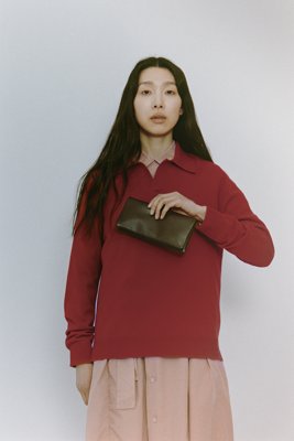 Cashmere knitted polo shirt. Light leather accessories. Minimal patterns, contemplative and meditative design.