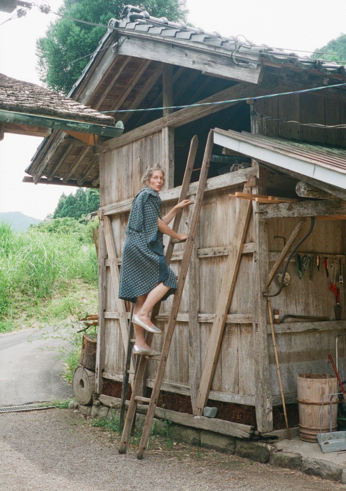 Mélanie climbing into the barn, Evening circle dress and stole by Butti Ajrakh, Hand-woven organic kara cotton fabric layered with indigo and natural dyeing