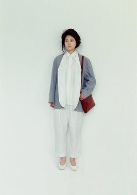 Reversible tailored haori jacket sumi-dyed linen outer with cotton linen typewriter lining, Front-fly shirt and folk pants in the same material as the lining, Naturally-tanned leather conductor bag